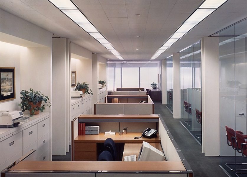 The lower floor houses accounting and administrative staff. Note that the niches at the side walls are evenly illuminated, creating a very comfortable and visually pleasing environment for these employees. Vertical surface lighting is often overlooked in many spaces.